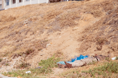 sleeping Homeless Man in Mouille Point Beach Capetown